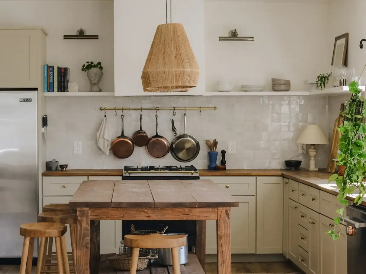 Finished farmhouse kitchen with an oak island